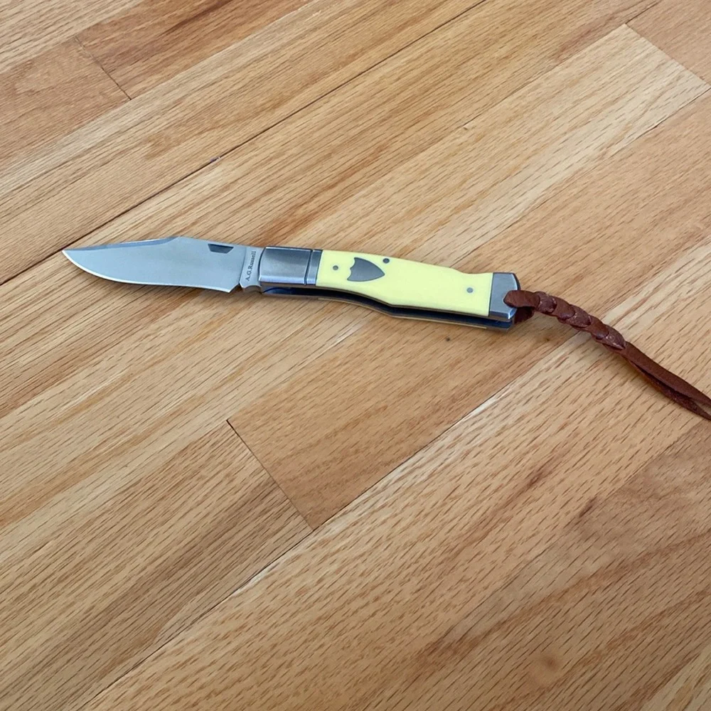 A.G.Russell Gu stock Lockbacks with Yellow Delrin - Picture 1 of 10